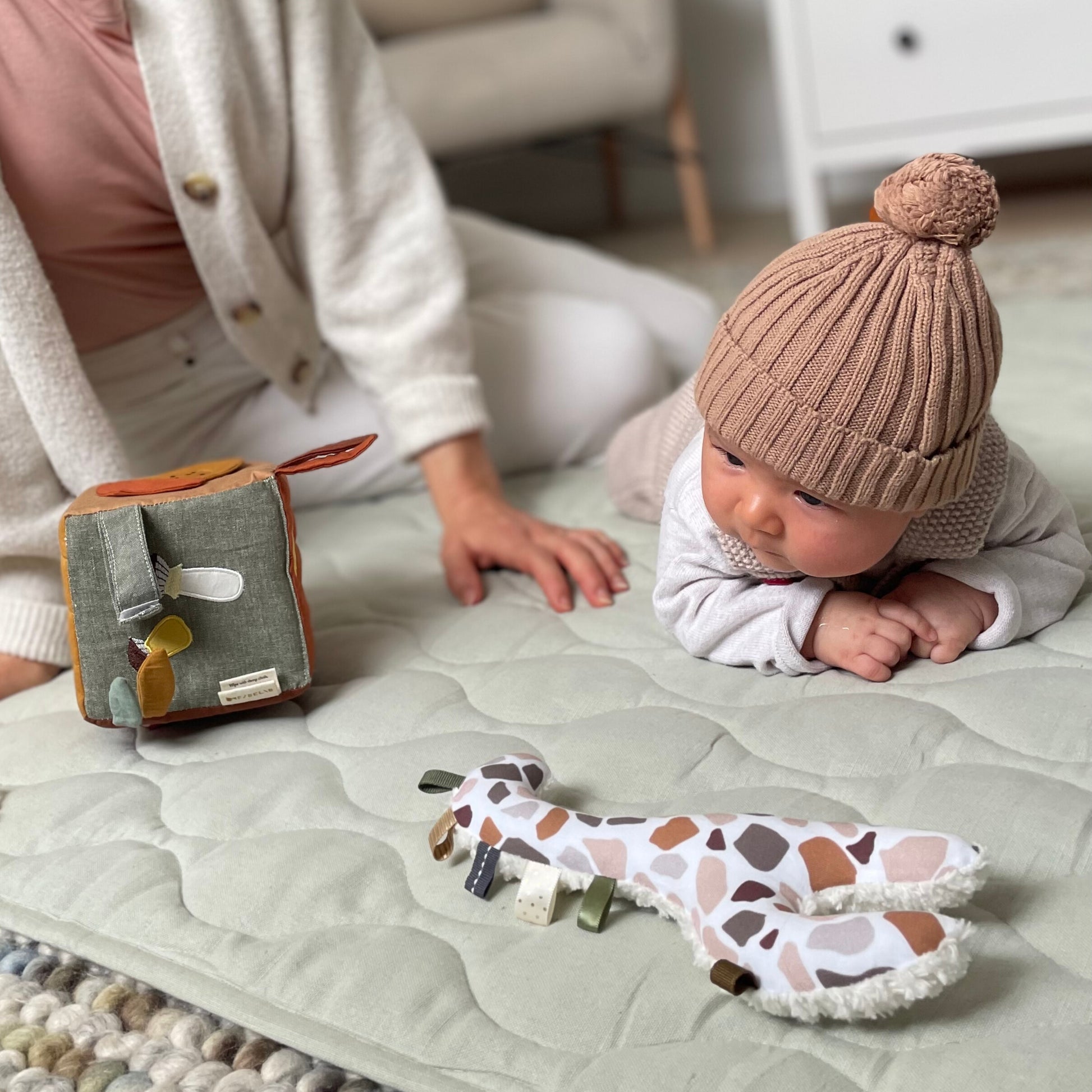 Tummy time activity mat, nursery floor mat. Quilted play mat for baby nursery or kids play room.