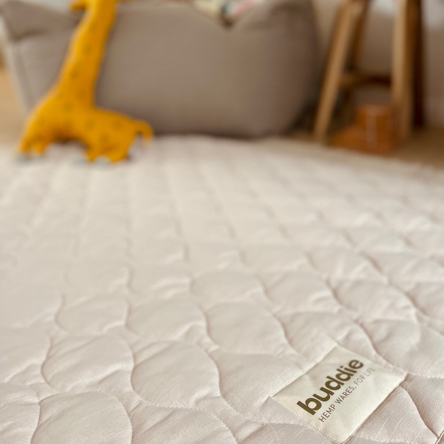 Quilted play rug. Indoor and outdoor use.