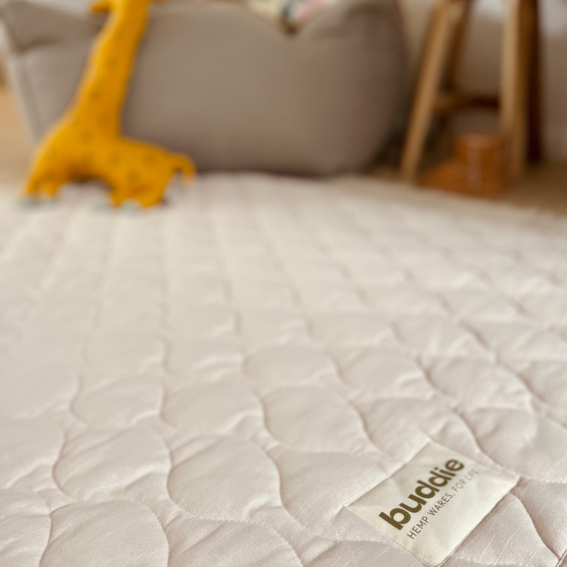 Quilted play rug. Indoor and outdoor use.